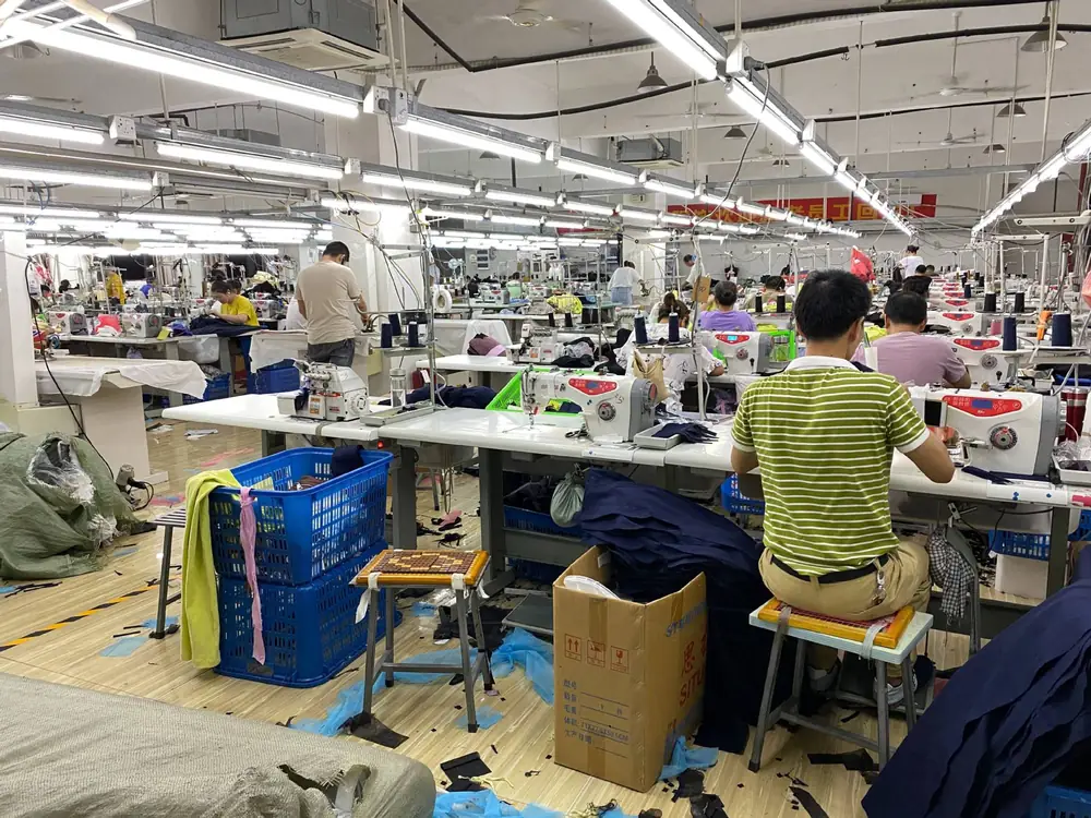 Low MOQ Apparel OEM/ODM Partner in China High angle view of Rezoty partner garment factory sewing workshop